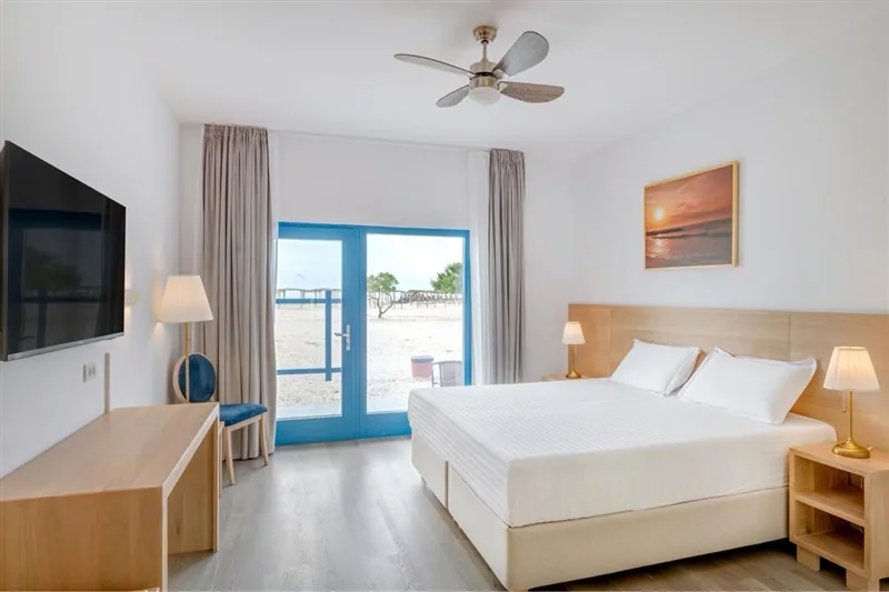 Coastal art photograph integrated into a Gura Portitei hotel guestroom.